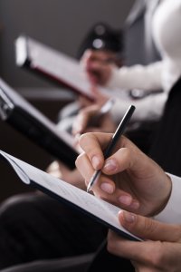 Close up of study desks and students